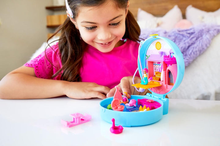 Polly Pocket Dolphin Beach Compact Playset with Micro Polly & Mermaid Doll, 5 Reveals & 13 Accessories