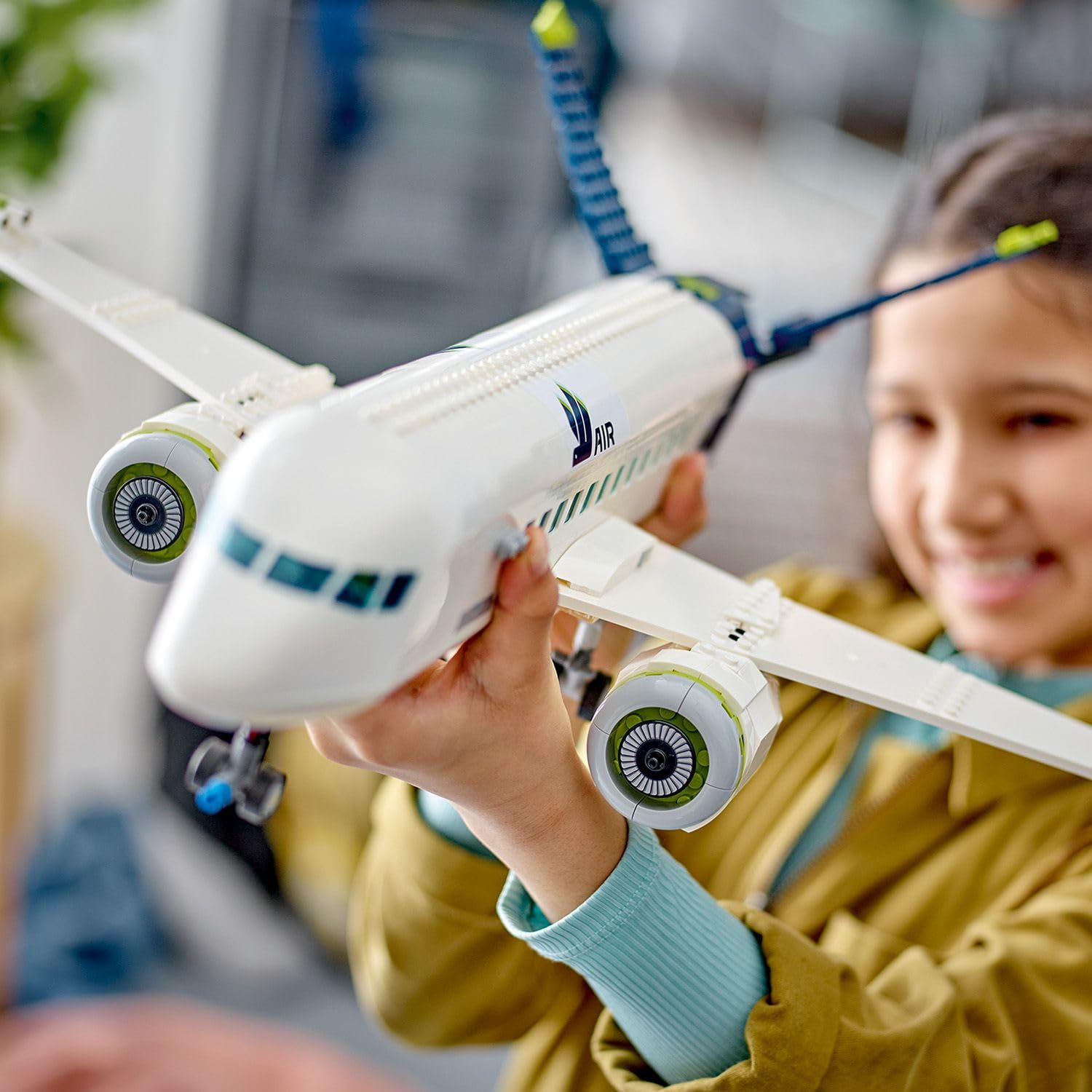 LEGO City Passenger Aeroplane Toy Set - 913-Piece Building Kit with 9 Minifigures & Airport Vehicles 3